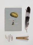 Notebook with man and yellow balloon from ViSSEVASSE 